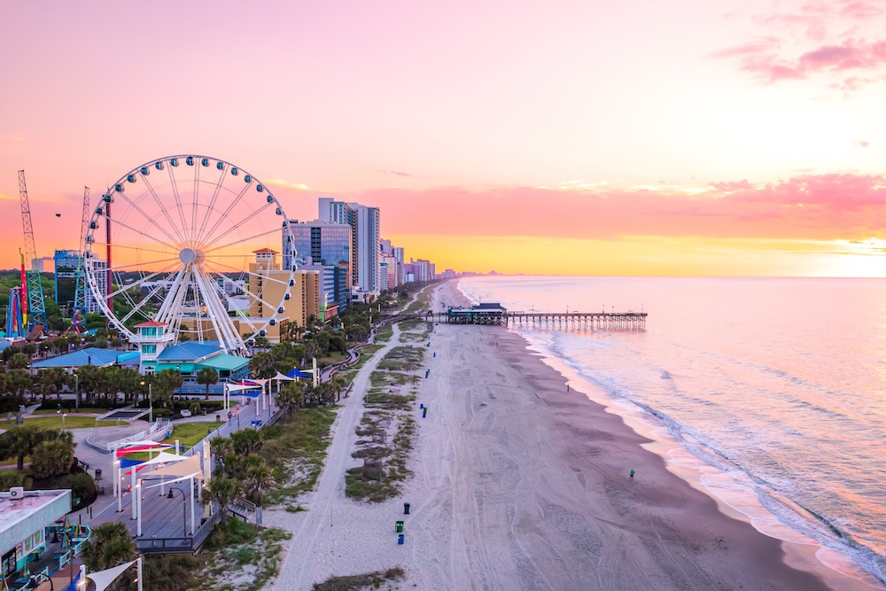 Aerial view of Myrtle Beach SkyWheel and Boardwalk at sunset