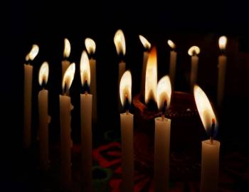 row of lit candles