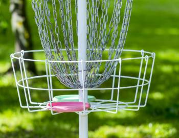 A frisbee on a disc golf course