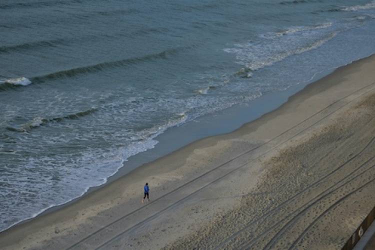woman jogging on the beach