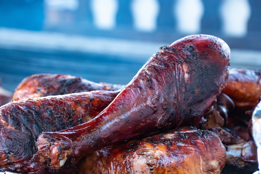 Closeup of a pile of smoked turkey legs