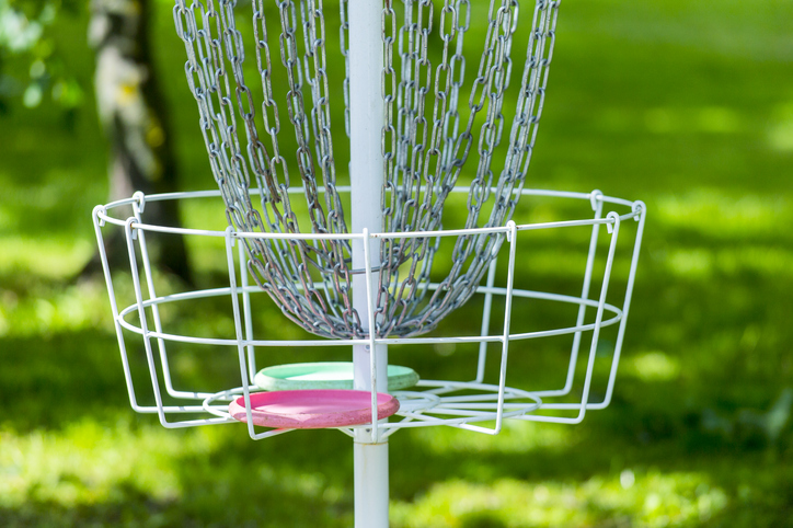 A frisbee on a disc golf course