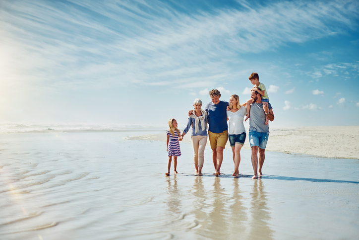 A family walking on a beach