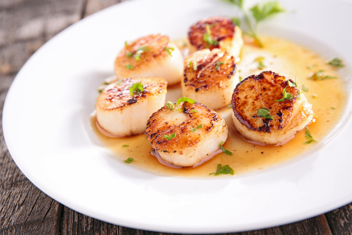 Scallops on a plate in a fine dining restaurant 