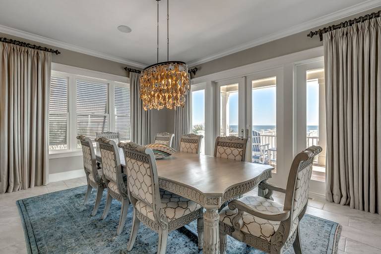 A dining table with oceanfront rooms