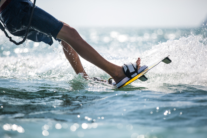 A person enjoys water-sports at the Shark Wake Park